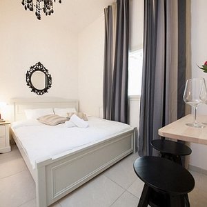 Room size 55 m²  This suite has a living room, kitchenette and private bathroom with a spa bath.