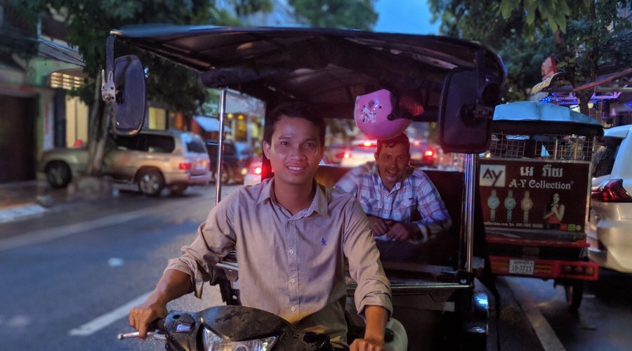 Kim's Tuk Tuk Service with a happy customer!