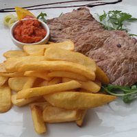 tagliata con rucola e grana