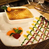 Crème brûlée with some Muña, a local herb with a subtle taste, blend of mint and thyme.