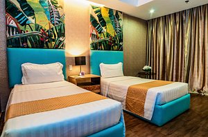 Aziza Paradise Hotel in Palawan Island, image may contain: Hotel, Building, Resort, Furniture