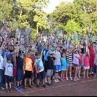 A gem of a tennis club in the woods for Adults and kids.