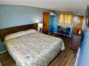 Hillside Motel in Saint John, image may contain: Furniture, Bed, Chair, Bedroom