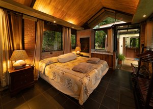 Altura Hotel in Poas Volcano National Park, image may contain: Bedroom, Indoors, Furniture, Resort