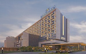 The Leela Ambience Convention Hotel, Delhi in New Delhi, image may contain: Hotel, Office Building, City, Convention Center