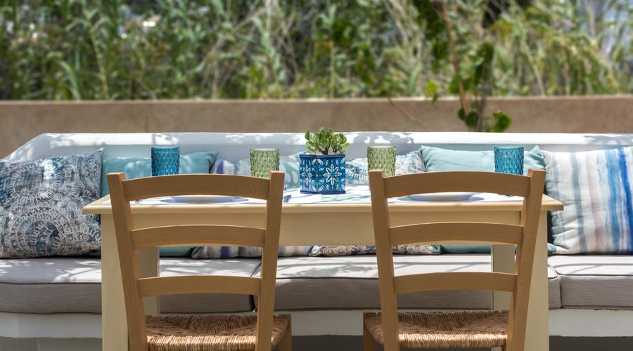 Built-in sofa in the yard, next to the vegetable garden 