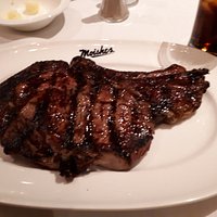 Rib steak - sides are extra.