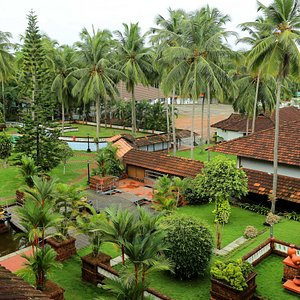 The Raviz Kadavu in Kozhikode, image may contain: Hotel, Resort, Villa, Pool