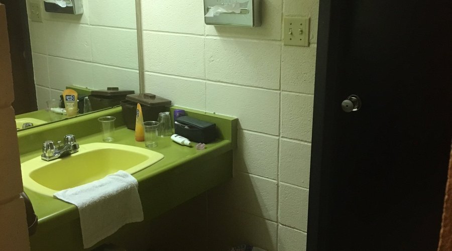 Separate sink from toilet/bath.
