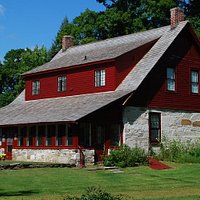 Frost Stone House viewed from SW, summer