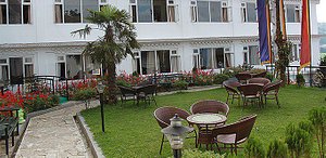 Little Tibet Resort in Darjeeling, image may contain: Resort, Hotel, Villa, Chair