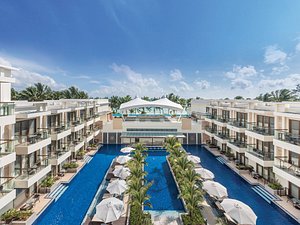Henann Palm Beach Resort in Panay Island, image may contain: Hotel, Resort, City, Condo