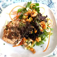 I had this two days in a row. Grilled salmon served with micro greens, yellow beans and carrot.
