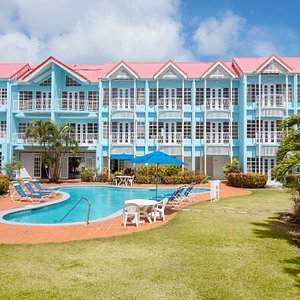Bay Gardens Marina Haven Hotel in St. Lucia, image may contain: Hotel, Resort, Building, Architecture