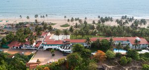 Longuinhos Beach Resort in Colva, image may contain: Hotel, Resort, Waterfront, Sea
