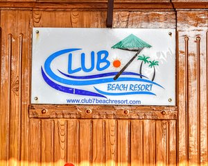 CLUB7 Beach Resort in Kannur, image may contain: Wood, Stained Wood, Hardwood, Logo