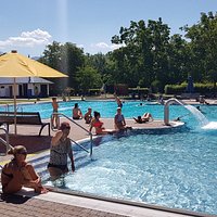 If you need a nice place to relax beside the pool, with happy children playing in the water, thi