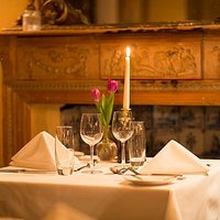 Candlelit dining in the main restaurant at Woolley Grange
