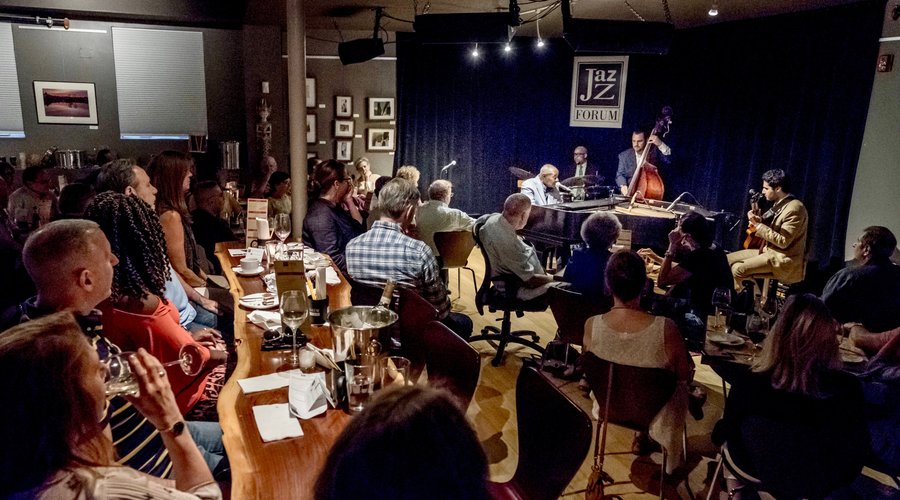 Audience members enthralled by singer Freddy Cole