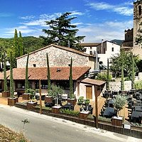 Terraza de la pizzeria 1900 de Cànoves