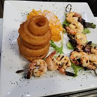 Shrimp Skewers with onion rings and coconut sweet potato mash