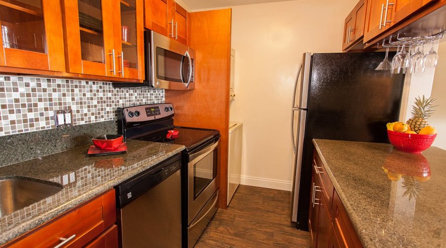 New marble countertops, new cabinets, View of ocean from kitchen !