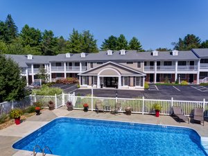 Port Inn Kennebunk, an Ascend Hotel Collection Member in Kennebunk, image may contain: Hotel, Resort, Chair, Pool