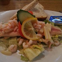 Smoked trout with shrimps and salad
