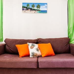 Sofa cama en la sala de estar de la habitacion superior