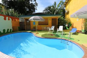 Hotel Boutique La Casa De Las Flores in Cahuita, image may contain: Villa, Resort, Hotel, Chair