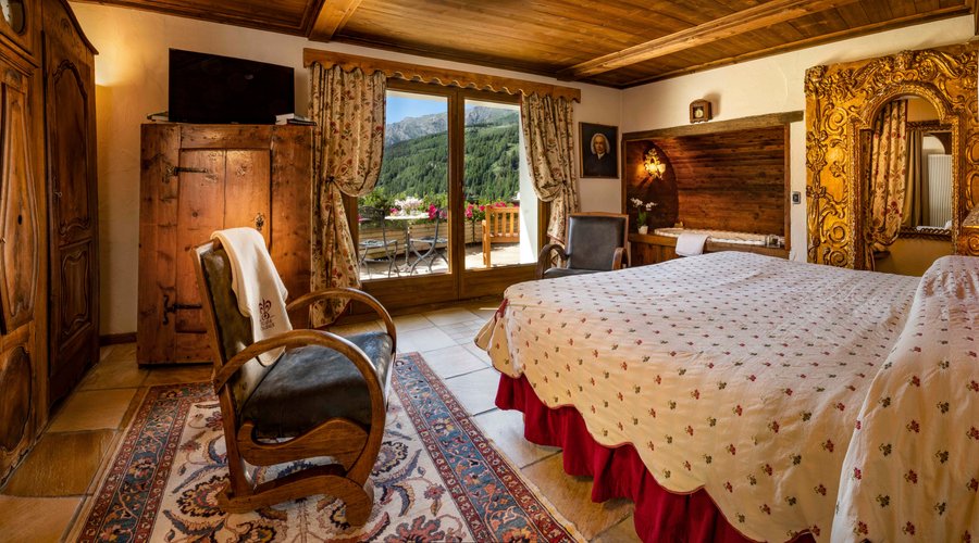 Camera deluxe / Suite con jacuzzi e caminetto (ad acqua)