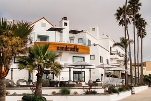 Sandcastle Hotel on the Beach in Pismo Beach, image may contain: Hotel, Resort, City, Palm Tree