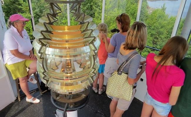 Visitors inside the lantern at Owls Head Light