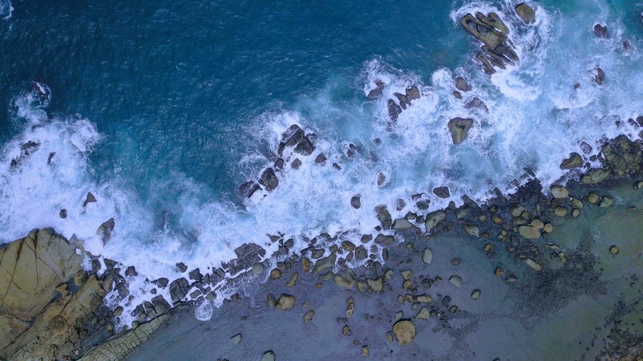 drone shots of the part of the beach we can't get to by foot