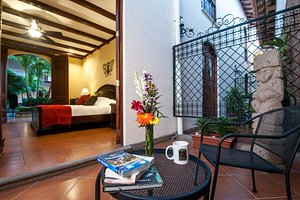 Hotel Plaza Colon in Granada, image may contain: Balcony, Cup, Resort, Chair