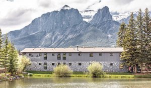 Lamphouse Hotel in Canmore, image may contain: Scenery, Outdoors, Tree, Peak