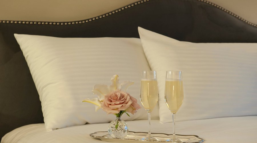 Plaza room detail with glasses of champagne waiting to be enjoyed. 
