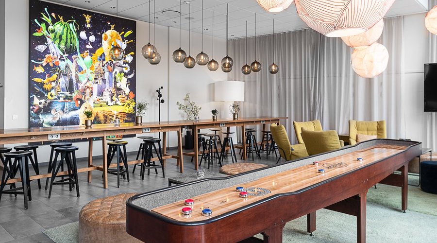 Lounge area with Tv and shuffleboard