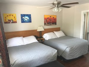 My Friends Inn Manitoulin in Manitoulin Island, image may contain: Bed, Furniture, Dorm Room, Ceiling Fan