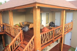 The Livingroom Hostel in Lombok, image may contain: Porch, Housing, Deck, Wood