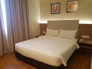 BIG M Hotel in Kuala Lumpur, image may contain: Furniture, Bed, Bedroom, Painting