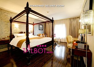 Talbot Hotel in Belmullet, image may contain: Furniture, Bedroom, Indoors, Interior Design