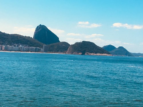 Premium Photo  Yacht club in urca bay of rio de janeiro and christ the  redeemer between the clouds leaning out