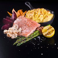 BBQ SALMON FILLET: Barbeque salmon fillet with shrimp sauce and asparagus wrapped in bacon.