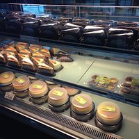 Carrot cake slices, chocolate cake slices and Hokkaido round cakes.