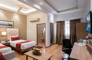 Kalinga Hotel in Jodhpur, image may contain: Screen, Bedroom, Furniture, Monitor