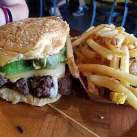 Avocado burger with garlic fries.
