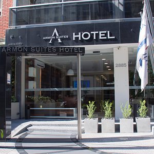 Armon Suites Hotel in Montevideo, image may contain: Furniture, Bed, Bedroom, Indoors