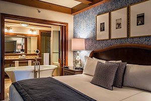 Hôtel Quintessence in Mont Tremblant, image may contain: Indoors, Home Decor, Bed, Bedroom