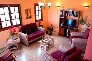 Hostal Olivia. Boca De Camarioca in Cuba, image may contain: Living Room, Couch, Monitor, Screen